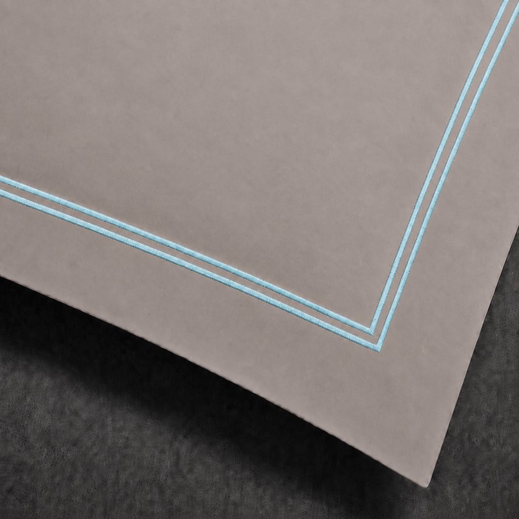 Stone polycotton percale 200TC Oxford pillow case, Standard and King, duck egg two row satin stitch — close-up detail.