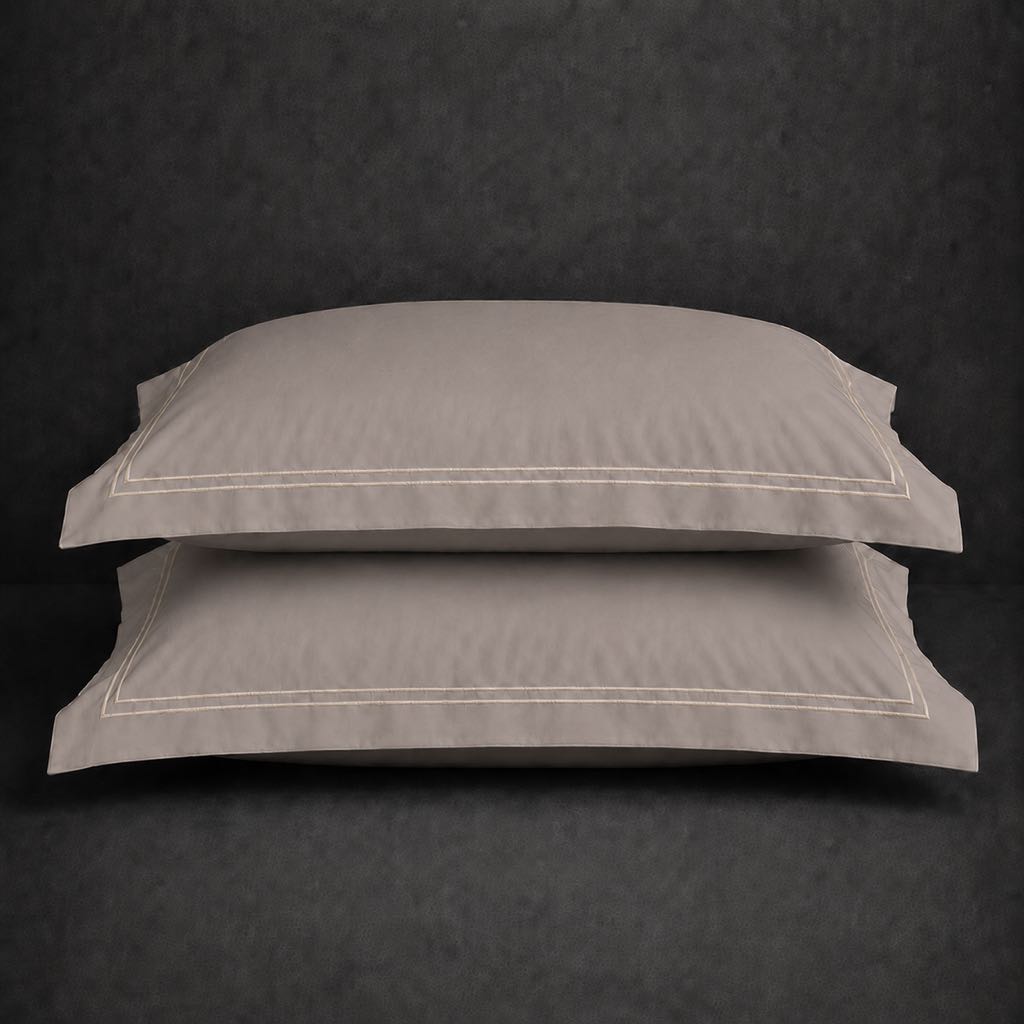 Stone polycotton percale 200TC Oxford pillow case, Standard and King, natural cream two row satin stitch — stacked pair view.