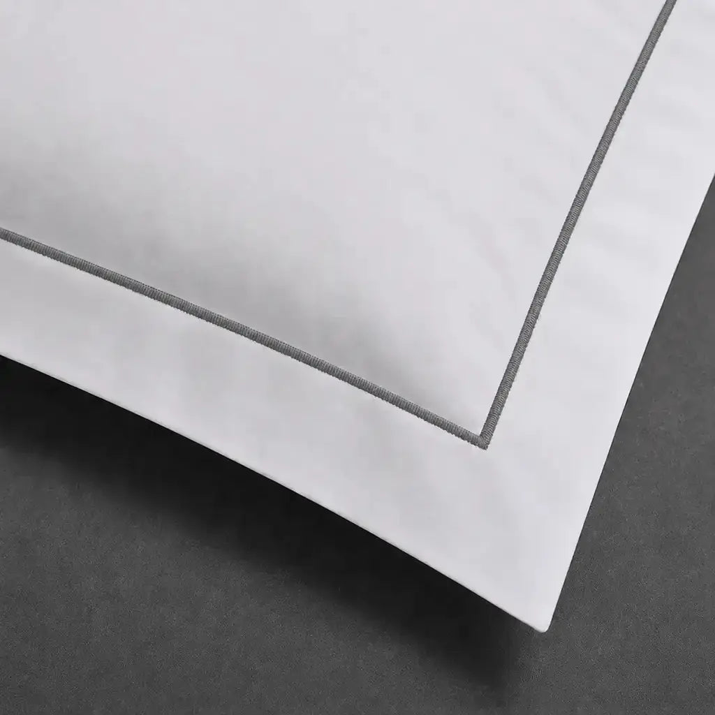 White polycotton percale 200TC Oxford pillow case, Standard and King, grey one-row satin stitch — close-up detail.