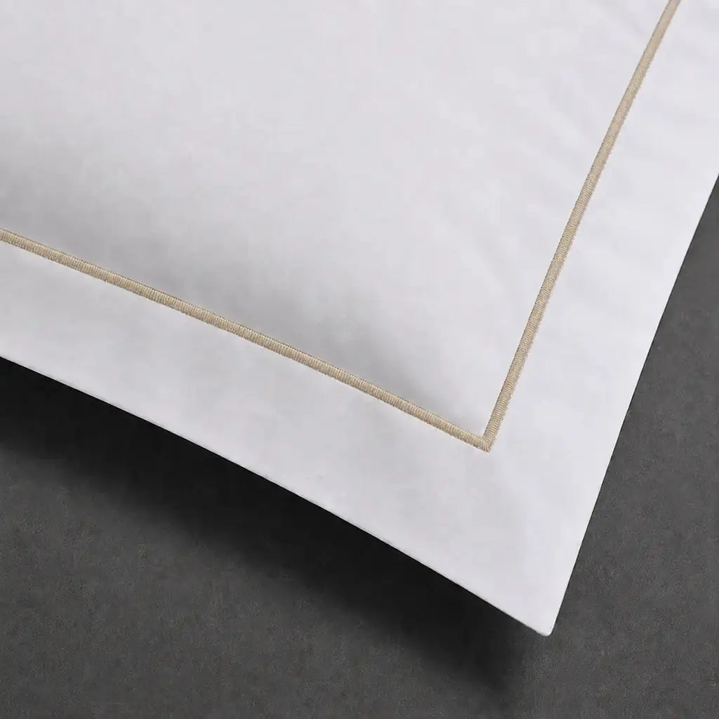 White polycotton percale 200TC Oxford pillow case, Standard and King, stone one-row satin stitch — close-up detail.