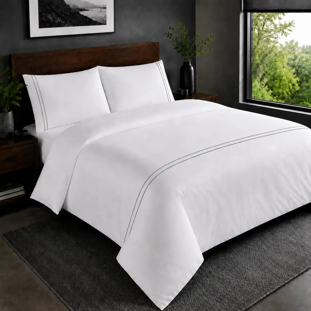 White 200TC plain duvet cover with Grey two row satin stitch - hero - Linen and Co