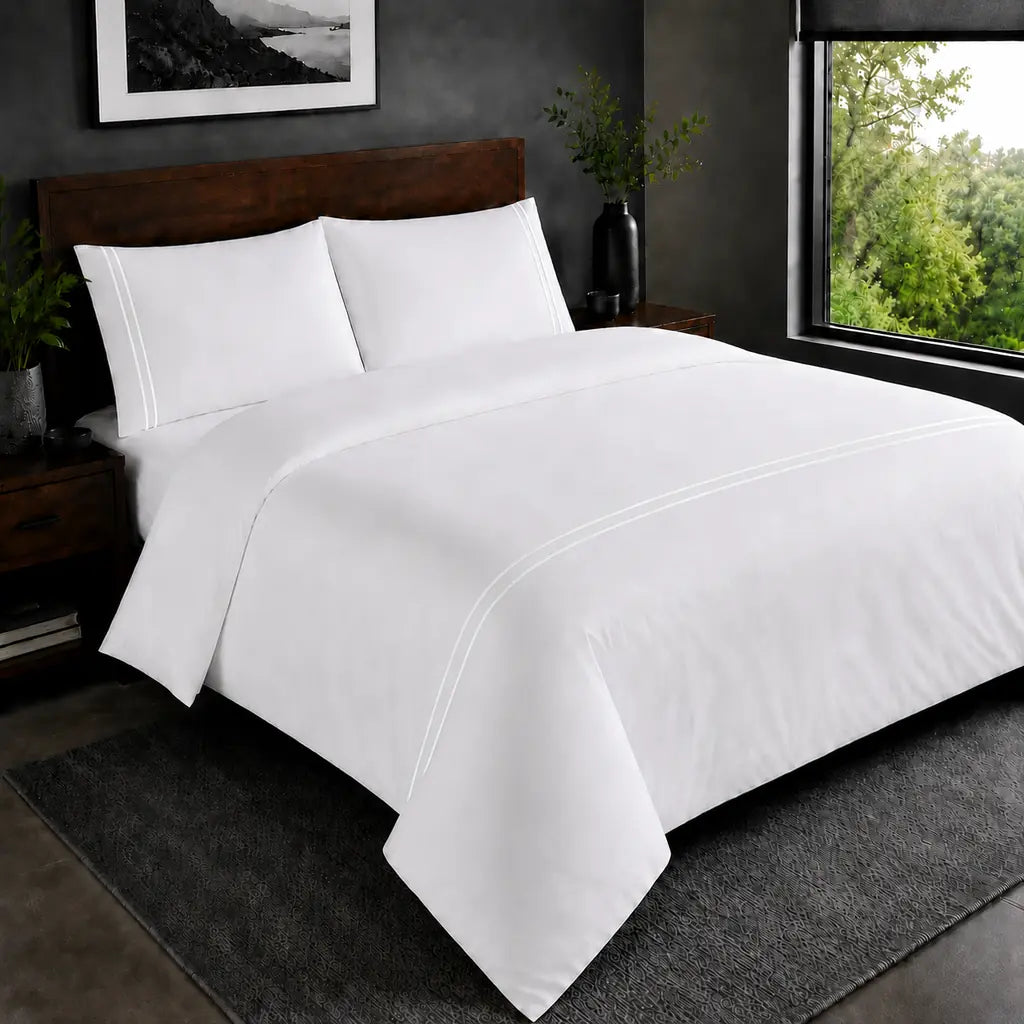 White 200TC plain duvet cover with White two row satin stitch - hero - Linen and Co