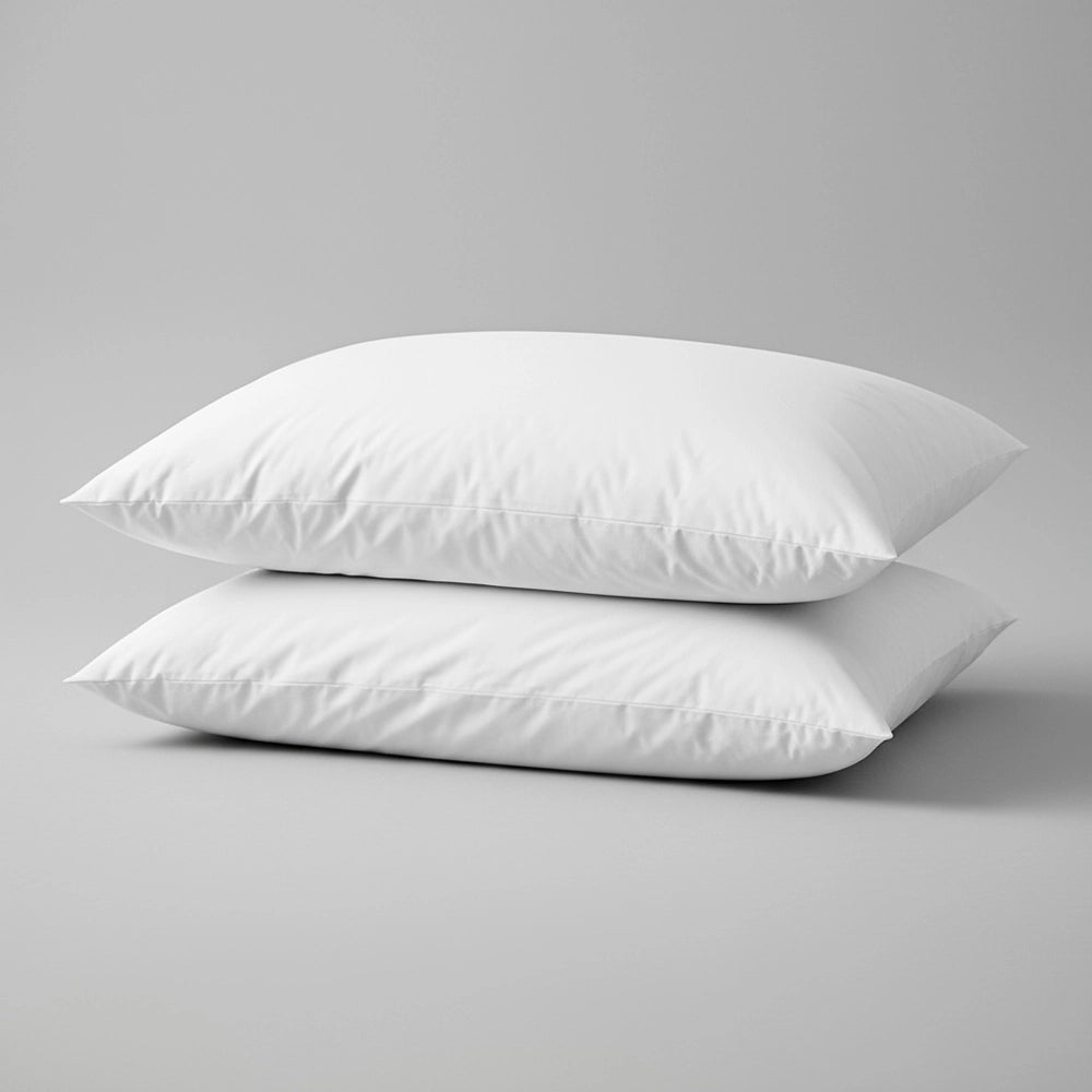 Premium Hungarian goose down pillow with white cotton cover displayed on neutral grey background, showcasing luxury texture and professional hospitality-grade quality