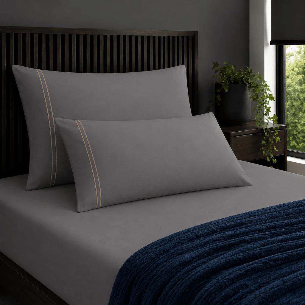 Plain grey 200TC 100% cotton percale pillowcases with two row stone satin stitch border by Linen and Co