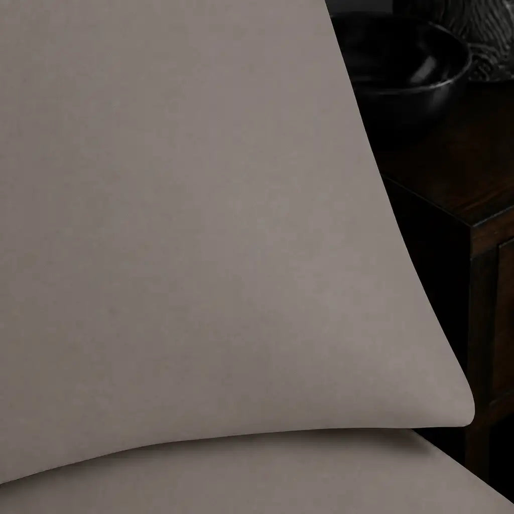 Close-up of stone pillowcase with no satin stitch border by Linen and Co