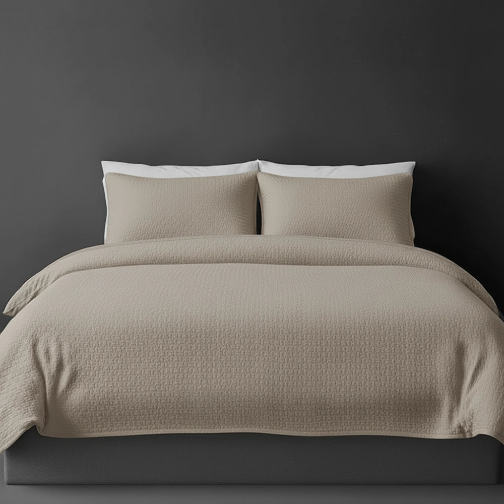 Stonel Berlin bedspread on bed by Linen and Co - luxury hospitality bedspread with textured finish