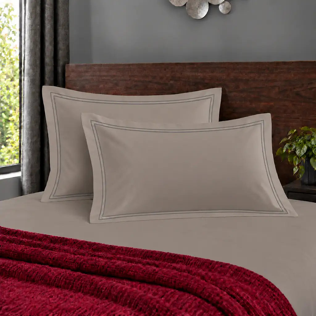 Oxford stone 200TC polycotton percale pillowcases with two row grey satin stitch border by Linen and Co