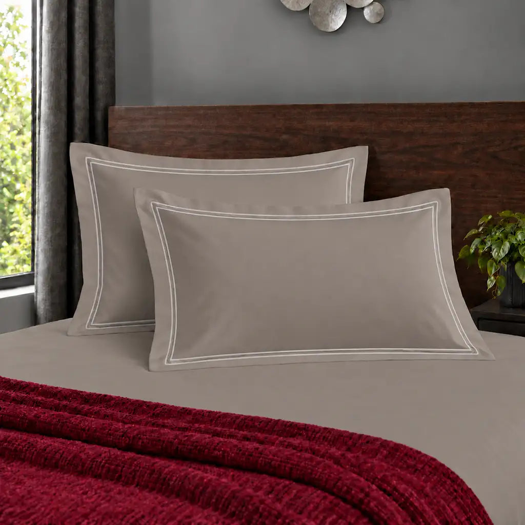 Oxford stone 200TC polycotton percale pillowcases with two row white satin stitch border by Linen and Co