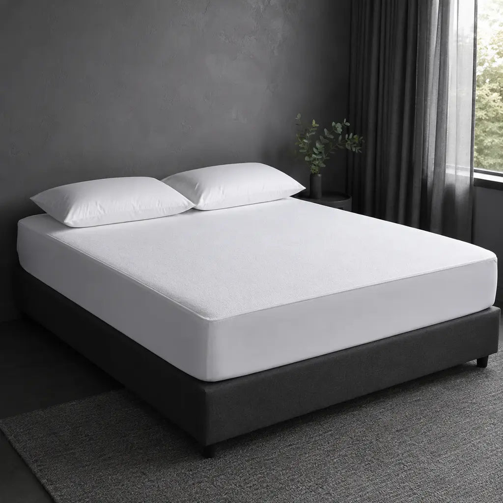 Towelling Wetsafe mattress protector in a cool grey bedroom by Linen and Co