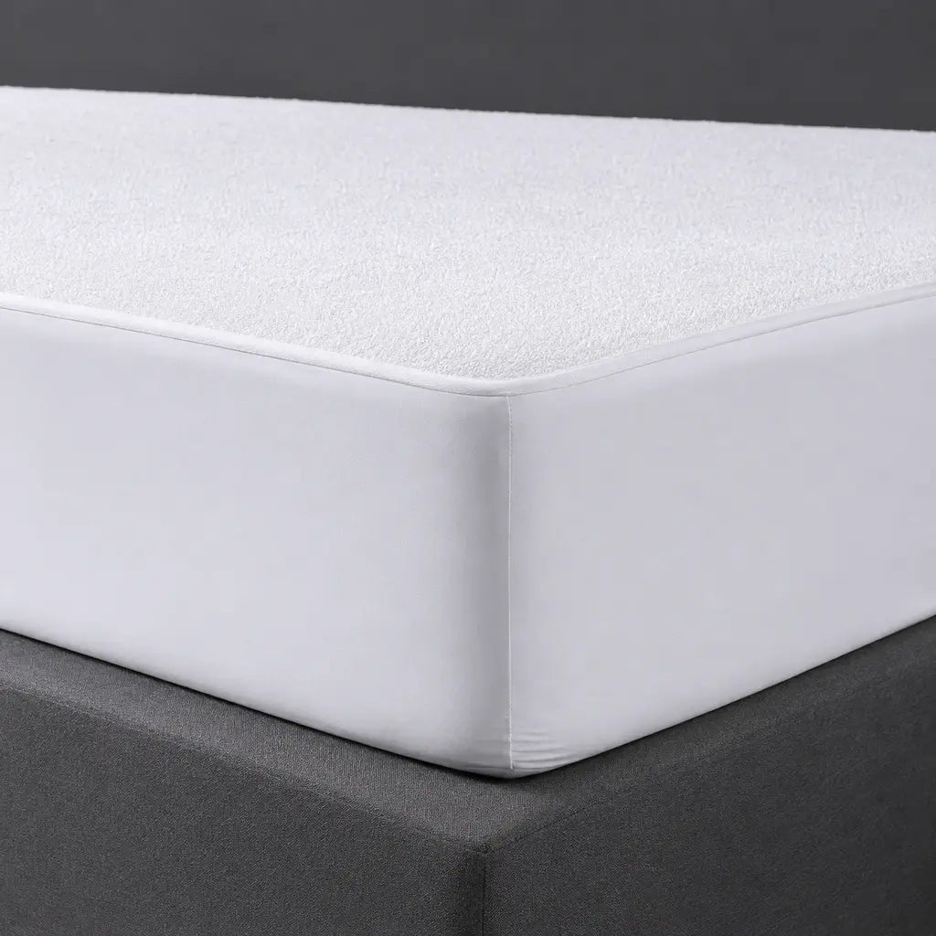 Fitted corner and 30 cm skirt of the Linen and Co Towelling Wetsafe mattress protector