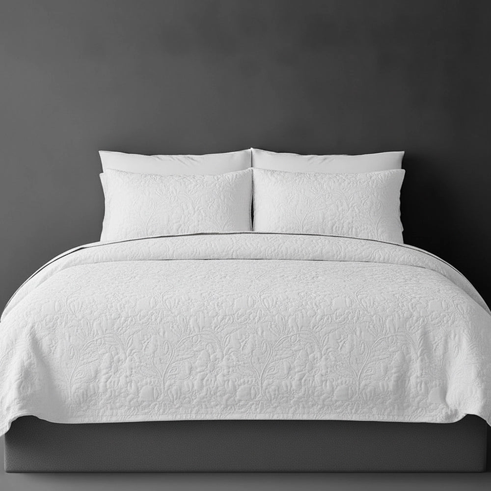 White Carmen bedspread on bed by Linen and Co - luxury hospitality bedspread with textured finish