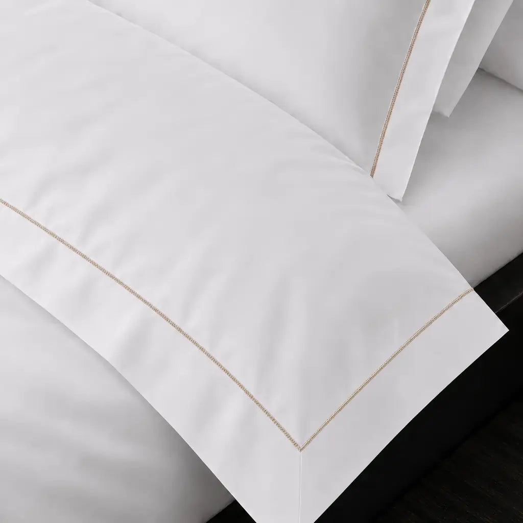 White Cotton 300TC Oxford duvet cover set with one row stone satin stitch — on-bed detail — Linen & Co