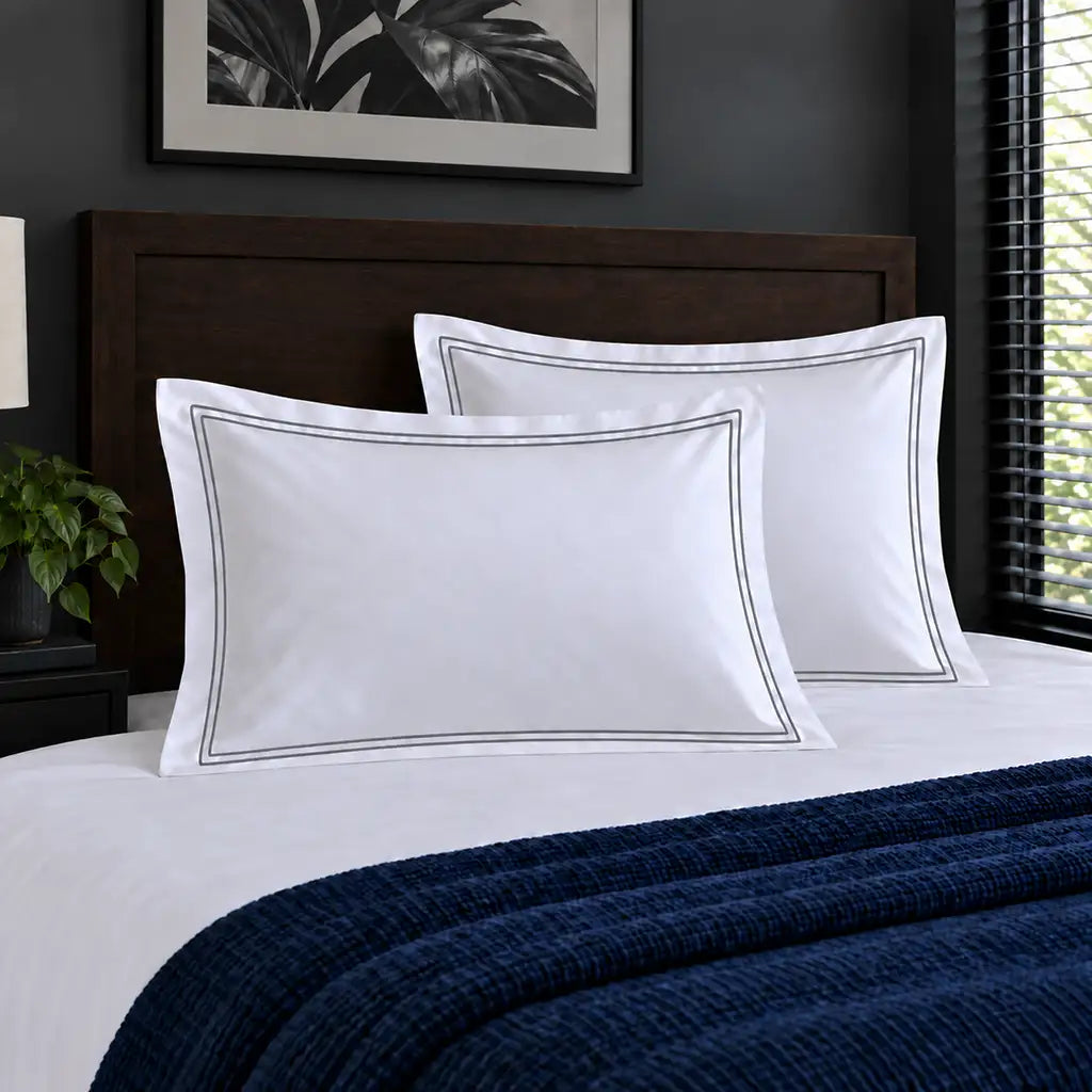 Oxford white 300TC 100% cotton percale pillowcases with two row grey satin stitch border by Linen and Co