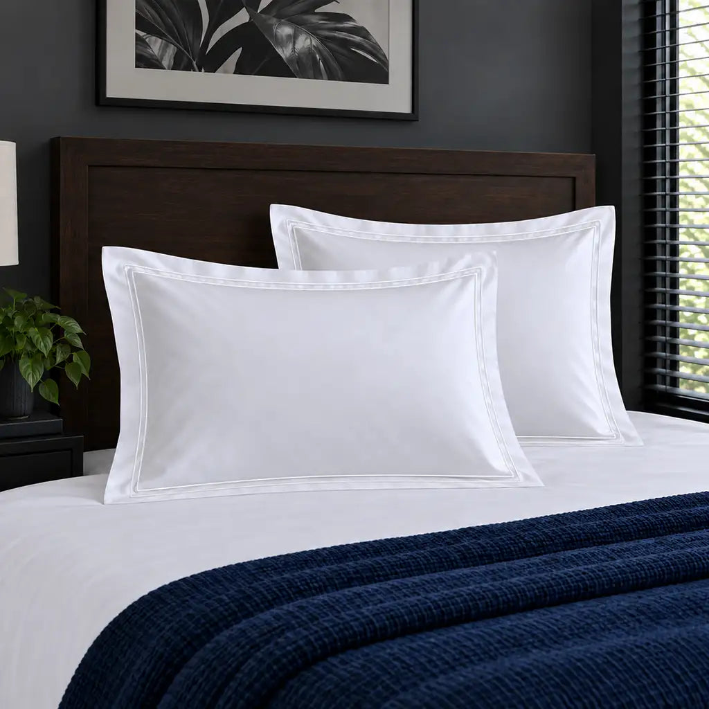 Oxford white 300TC 100% cotton percale pillowcases with two row white satin stitch border by Linen and Co
