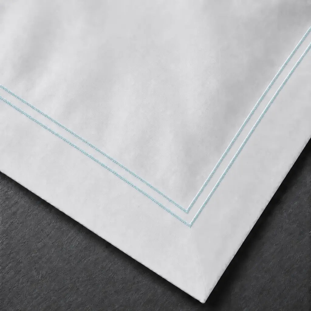 White Cotton 300TC Oxford duvet cover set with two row duck egg satin stitch — embroidery close-up — Linen & Co