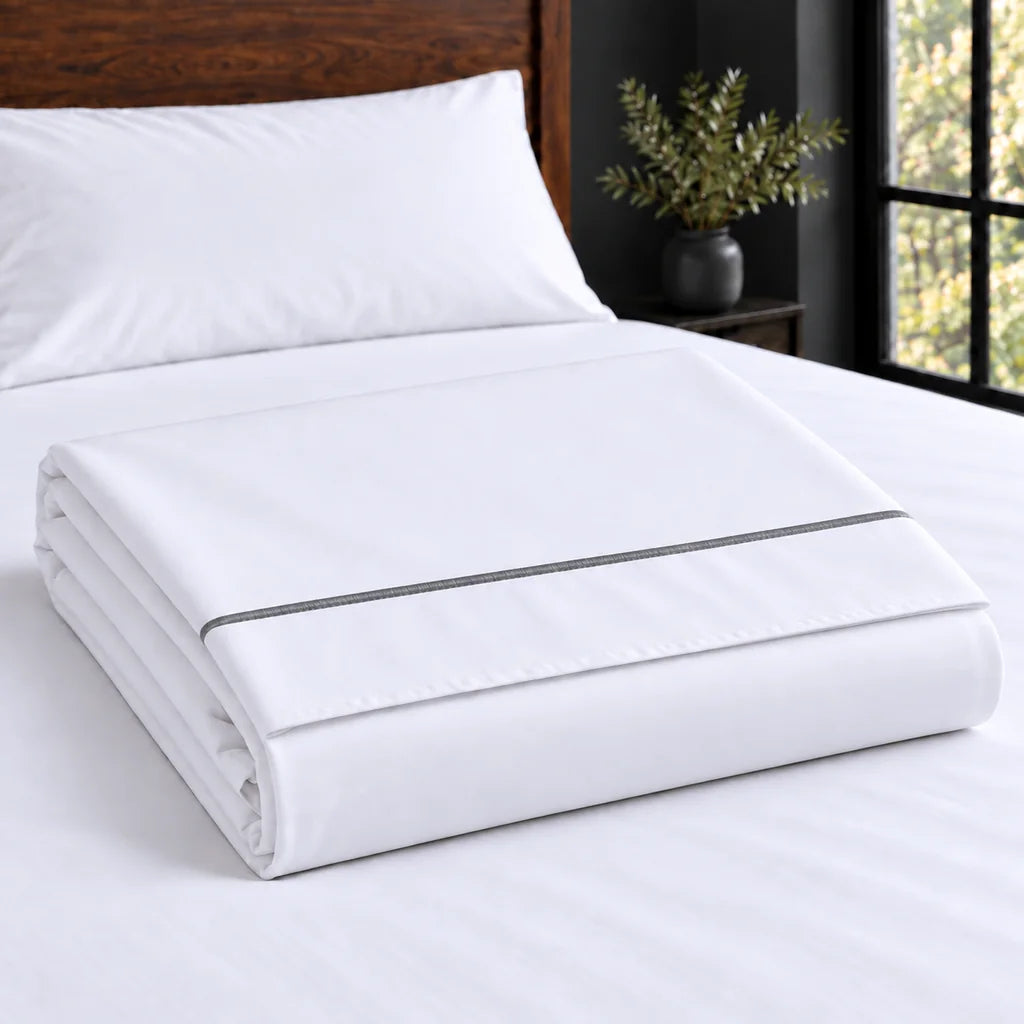 white polycotton percale 200tc flat sheet, one row grey satin stitch — construction — Linen and Co
