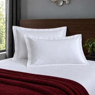 Oxford white 200TC polycotton percale pillowcases with no satin stitch border by Linen and Co