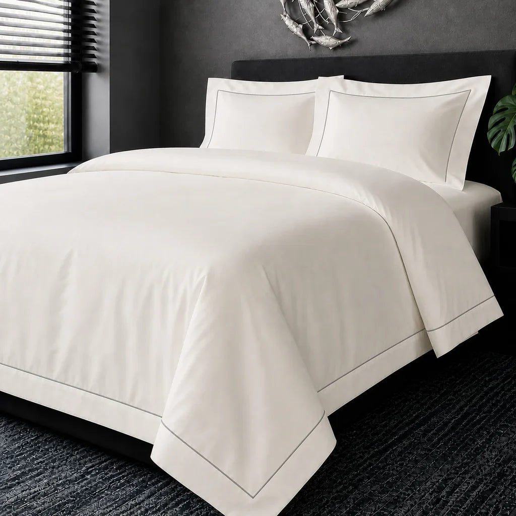 Cream cotton 200TC Oxford duvet cover set with grey one-row satin stitch – hero view | Linen & Co