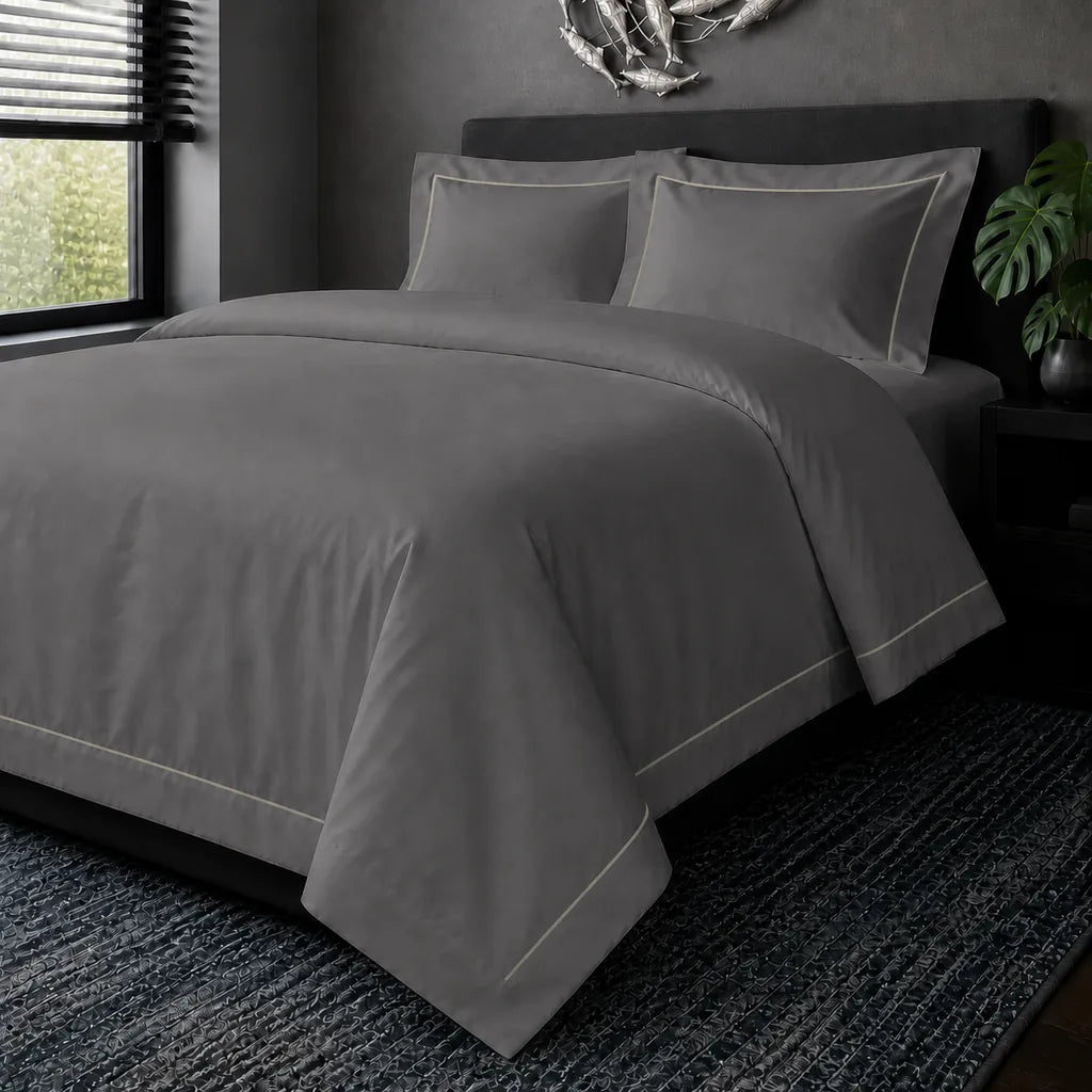 Grey cotton 200TC Oxford duvet cover set with cream one-row satin stitch – hero view | Linen & Co