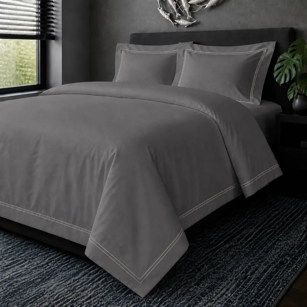 Grey cotton 200TC Oxford duvet cover set with cream two-row satin stitch – hero view | Linen & Co