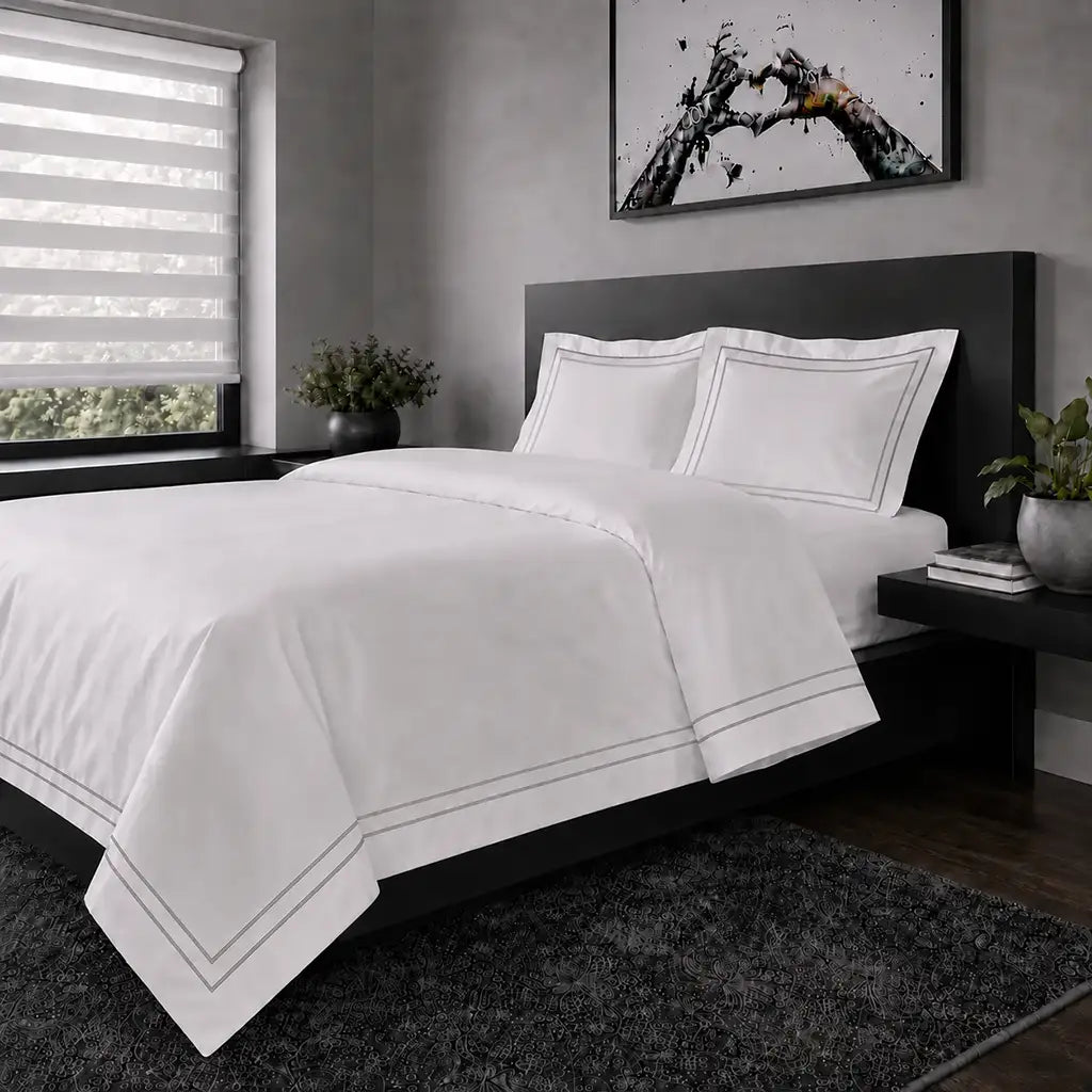 White polycotton percale Oxford duvet cover set with grey two-row satin stitch – hero view | Linen & Co