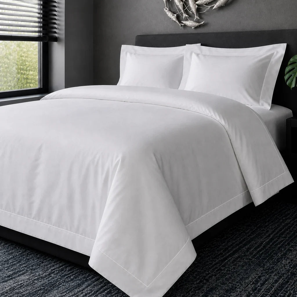 White cotton 200TC Oxford duvet cover set with white one-row satin stitch – hero view | Linen & Co