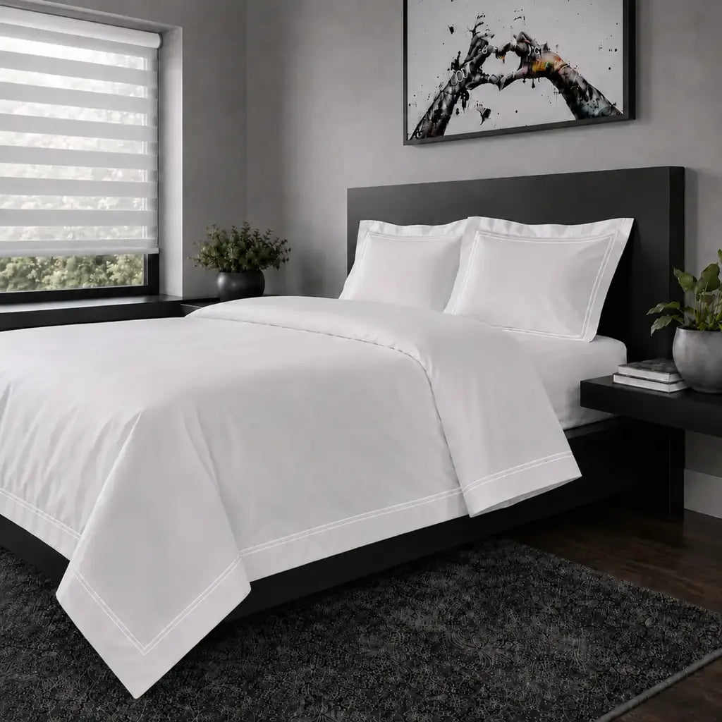 White polycotton percale Oxford duvet cover set with white two-row satin stitch – hero view | Linen & Co