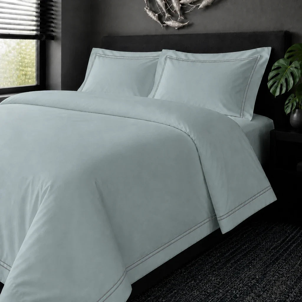 Duck Egg cotton 200TC Oxford duvet cover set with grey two-row satin stitch – on the bed view | Linen & Co