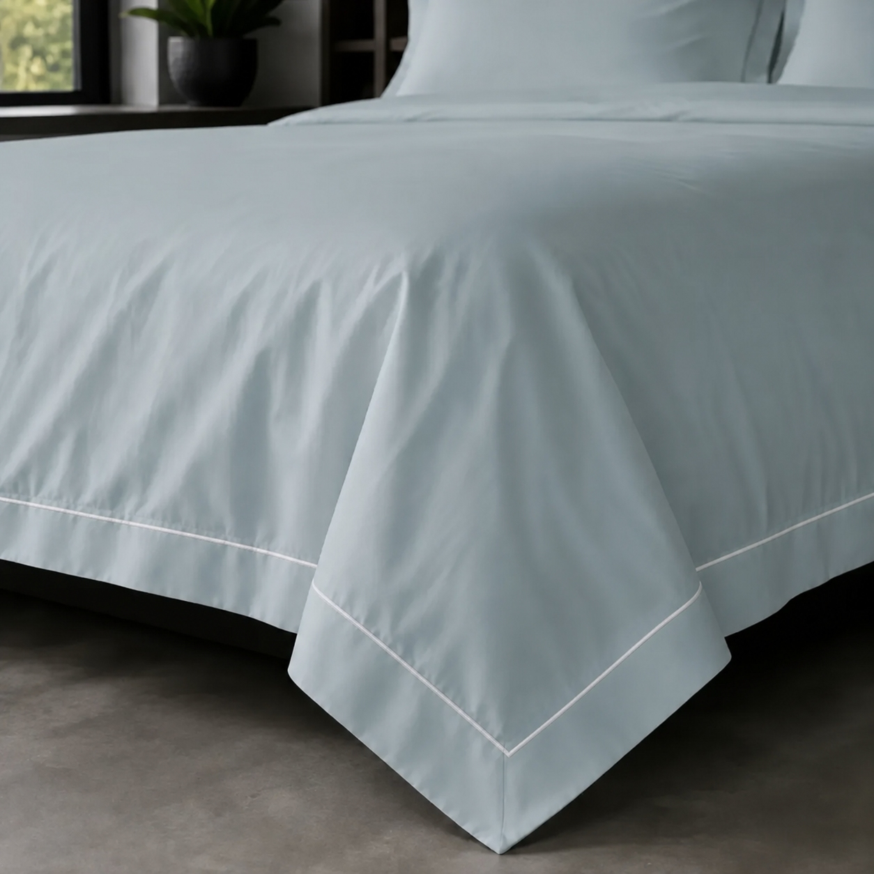 Duck Egg Oxford duvet cover set - White One Row Satin Stitch - on-the-bed corner view - Linen and Co