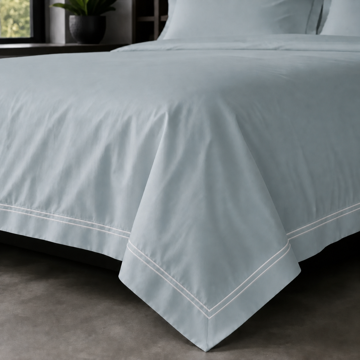 Duck Egg Oxford duvet cover set - White Two Row Satin Stitch - on-the-bed corner view - Linen and Co