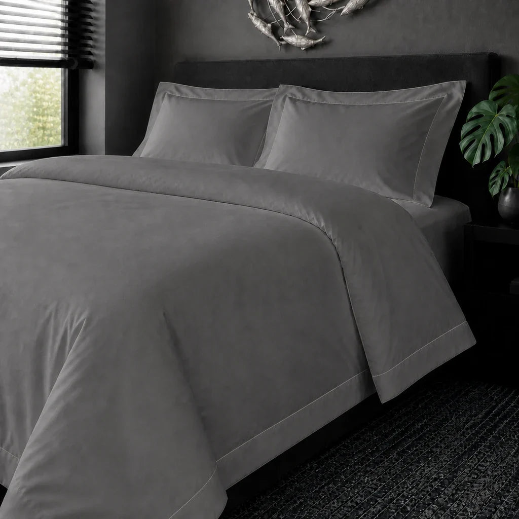 Grey cotton 200TC Oxford duvet cover set with stone one-row satin stitch – on the bed view | Linen & Co