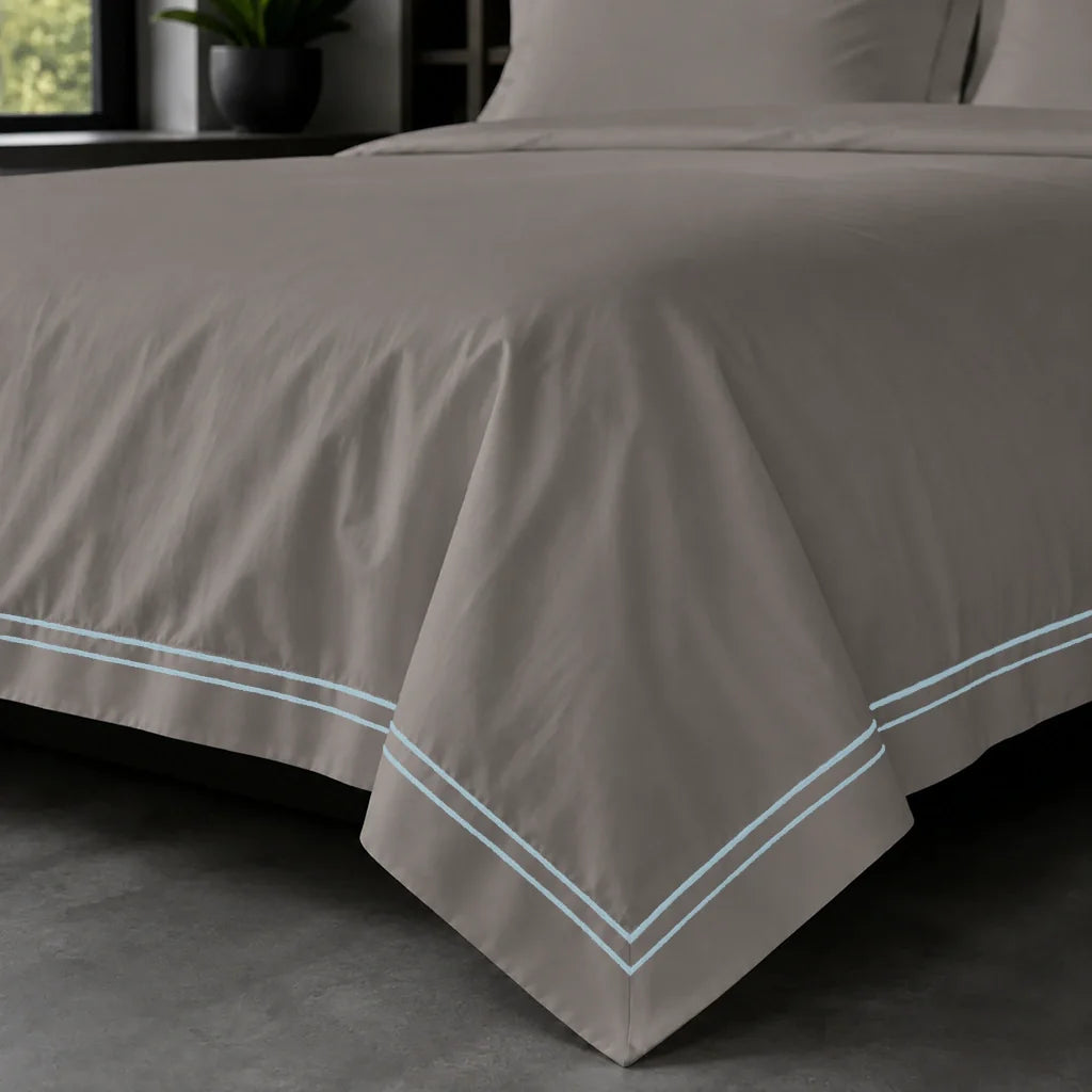 Oxford duvet cover set - Duck Egg Two Row Satin Stitch - on-the-bed corner view - Linen and Co