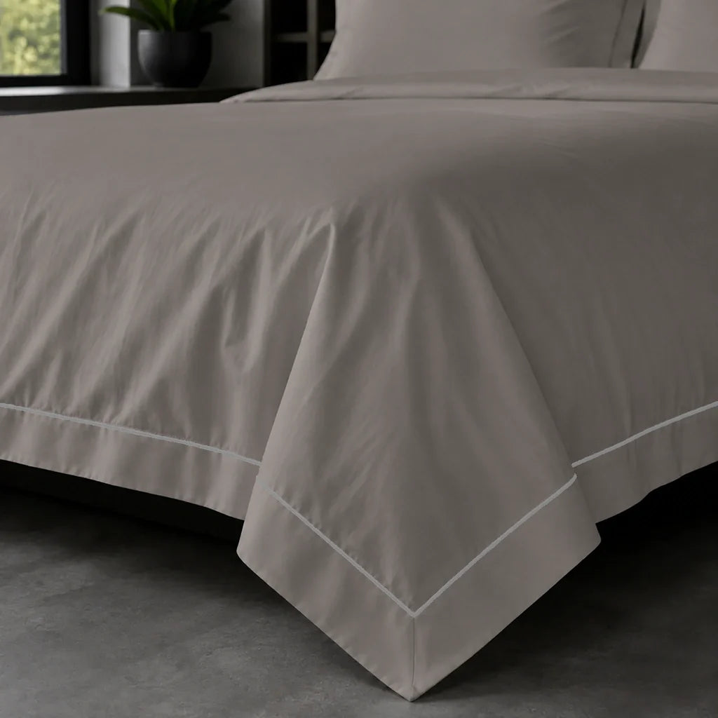 Oxford duvet cover set - Grey One Row Satin Stitch - on-the-bed corner view - Linen and Co
