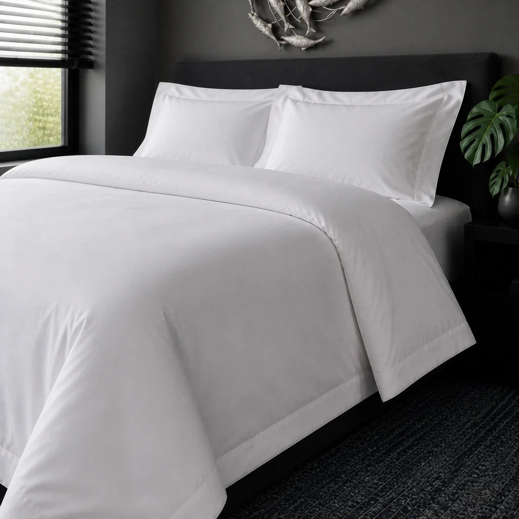 White cotton 200TC Oxford duvet cover set, no satin stitch – on-bed view | Linen & Co