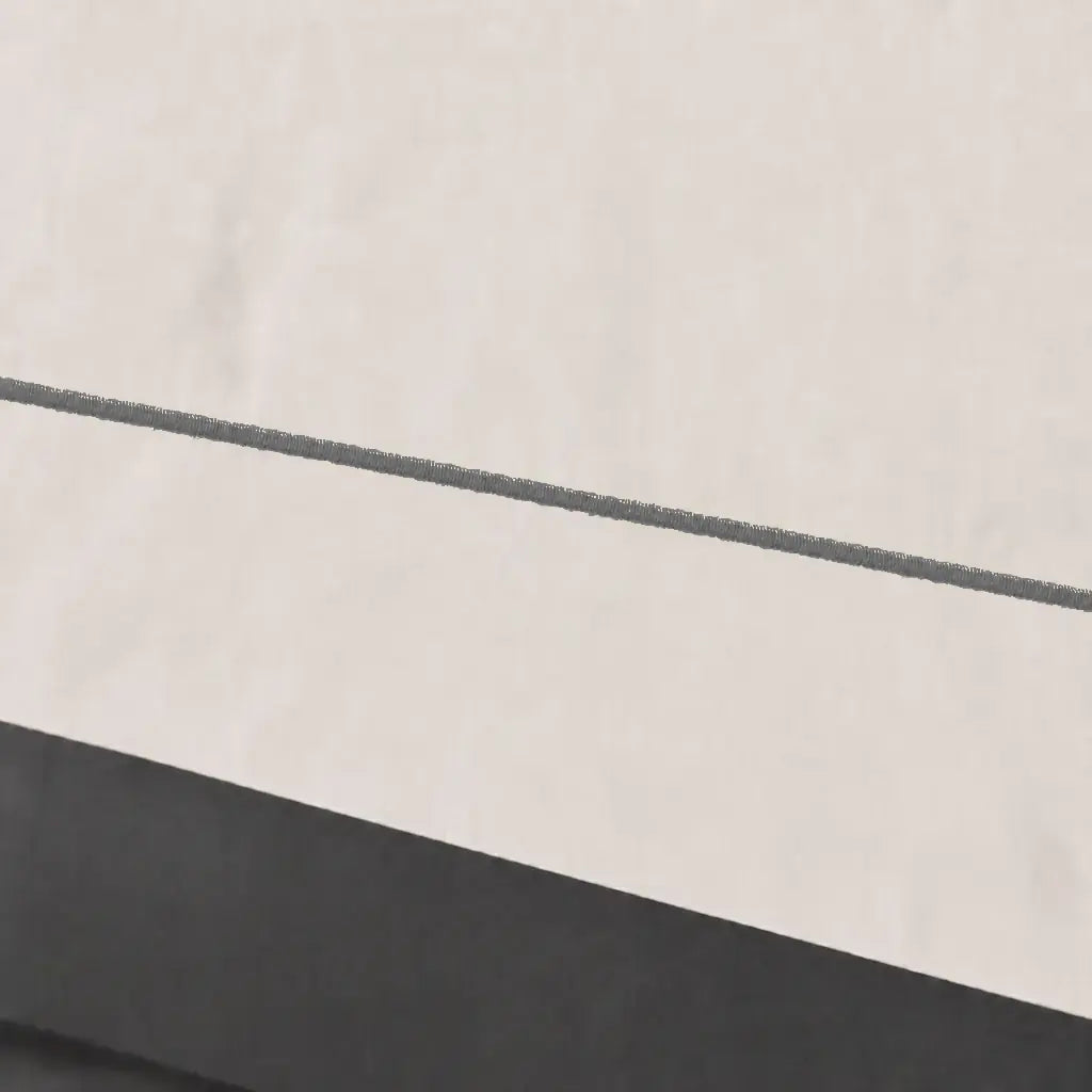 Close-up of cream polycotton percale 200TC Oxford cuff with grey one-row satin stitch - Linen and Co