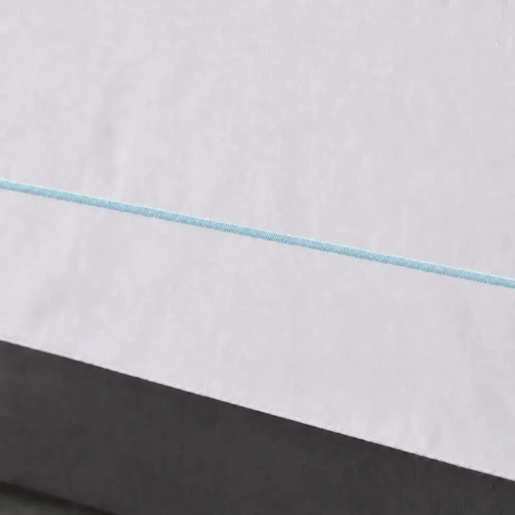 White cotton 200TC Oxford duvet cover set with duck egg one-row satin stitch – close-up view | Linen & Co