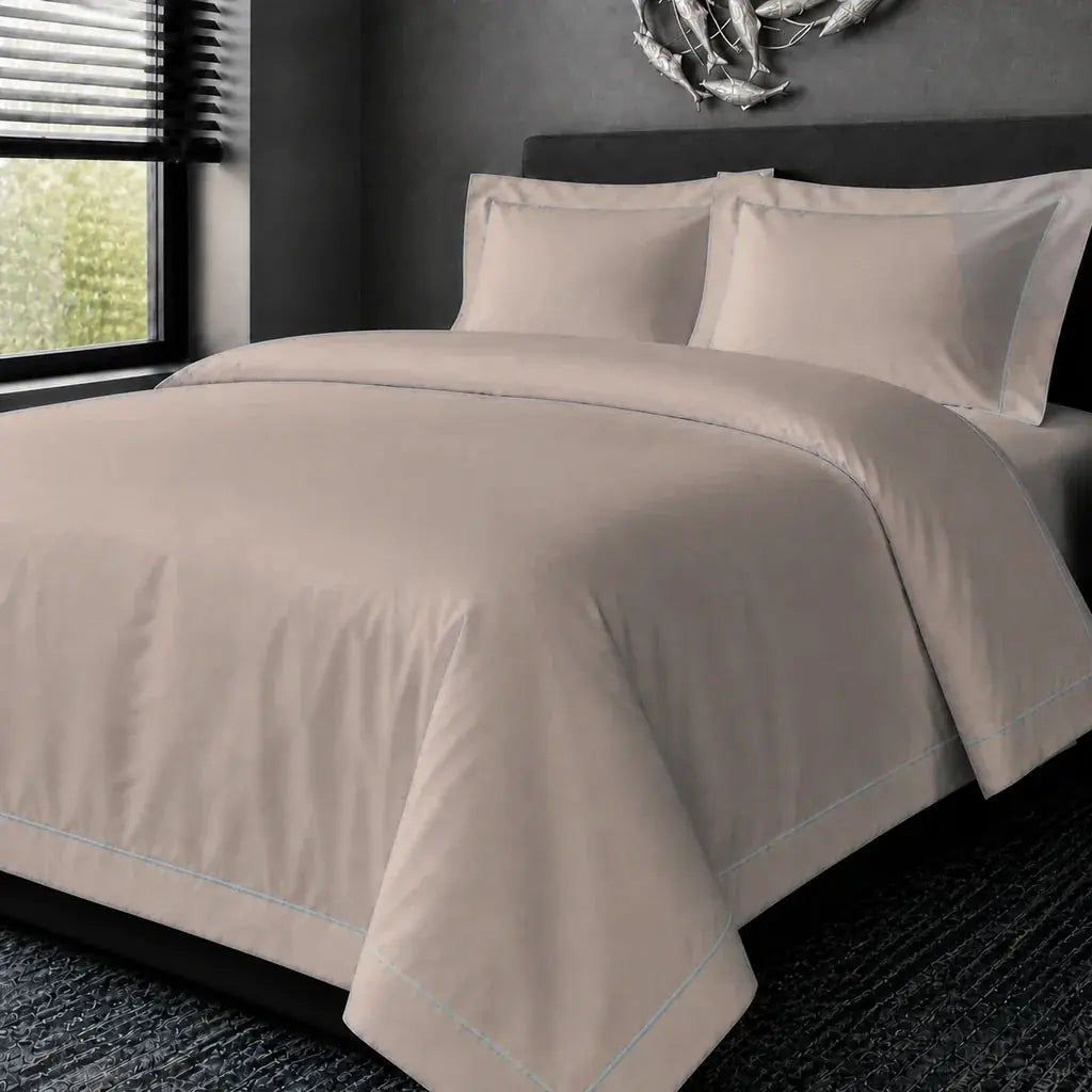 Stone Cotton 200TC Oxford duvet cover set with Duck Egg one-row satin stitch, hero view.