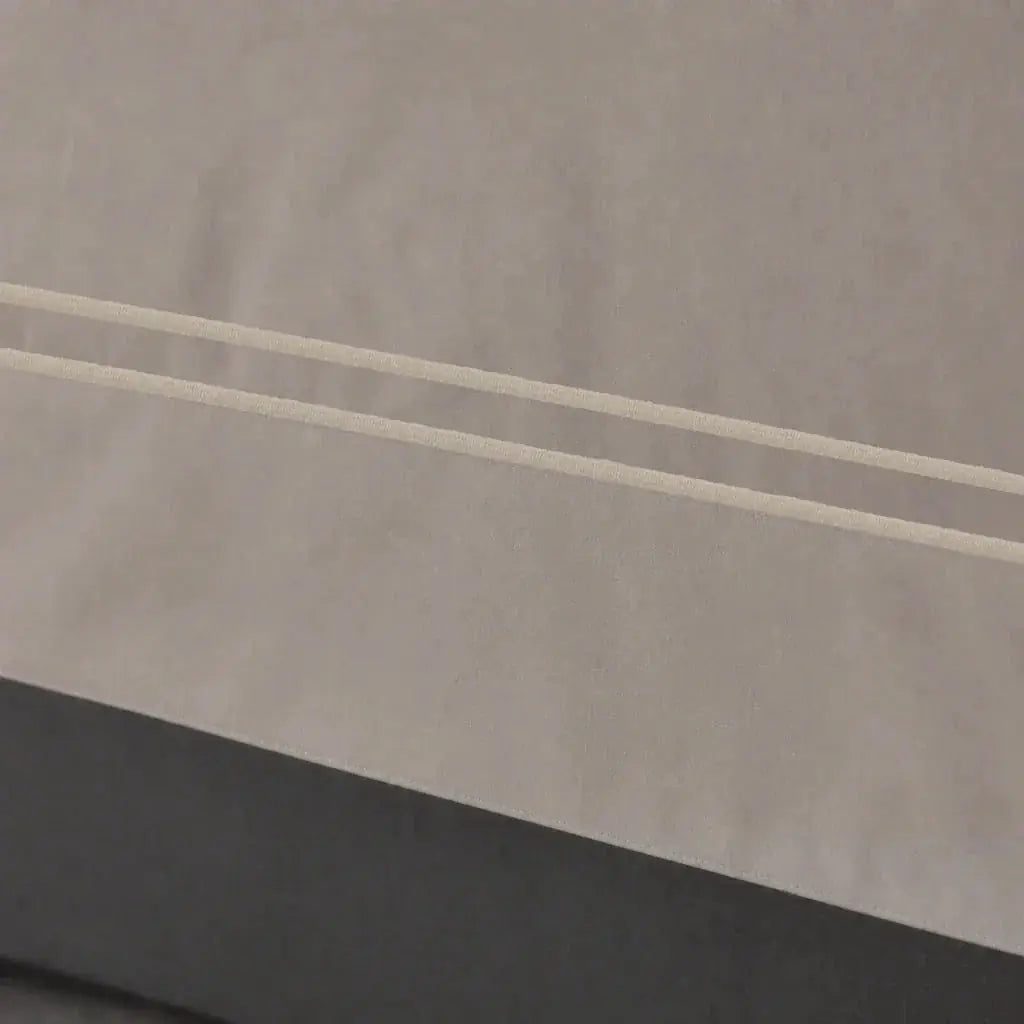 Close-up of the Stone Cotton 200TC Oxford duvet cover border with stone two-row satin stitch.