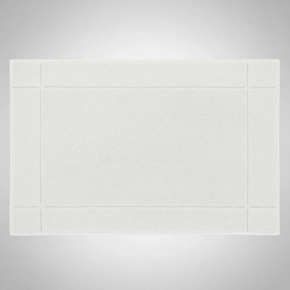 High-quality white bath mat from Linen and Co's Glodina range, illustrating superior absorbency and commercial-grade performance for hospitality environments