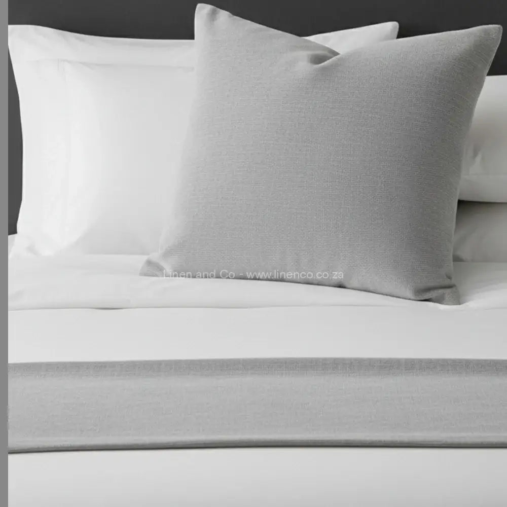 Light grey-coloured chenille bed end runner and scatter cushion on white bedding - premium hospitality bedding by Linen & Co