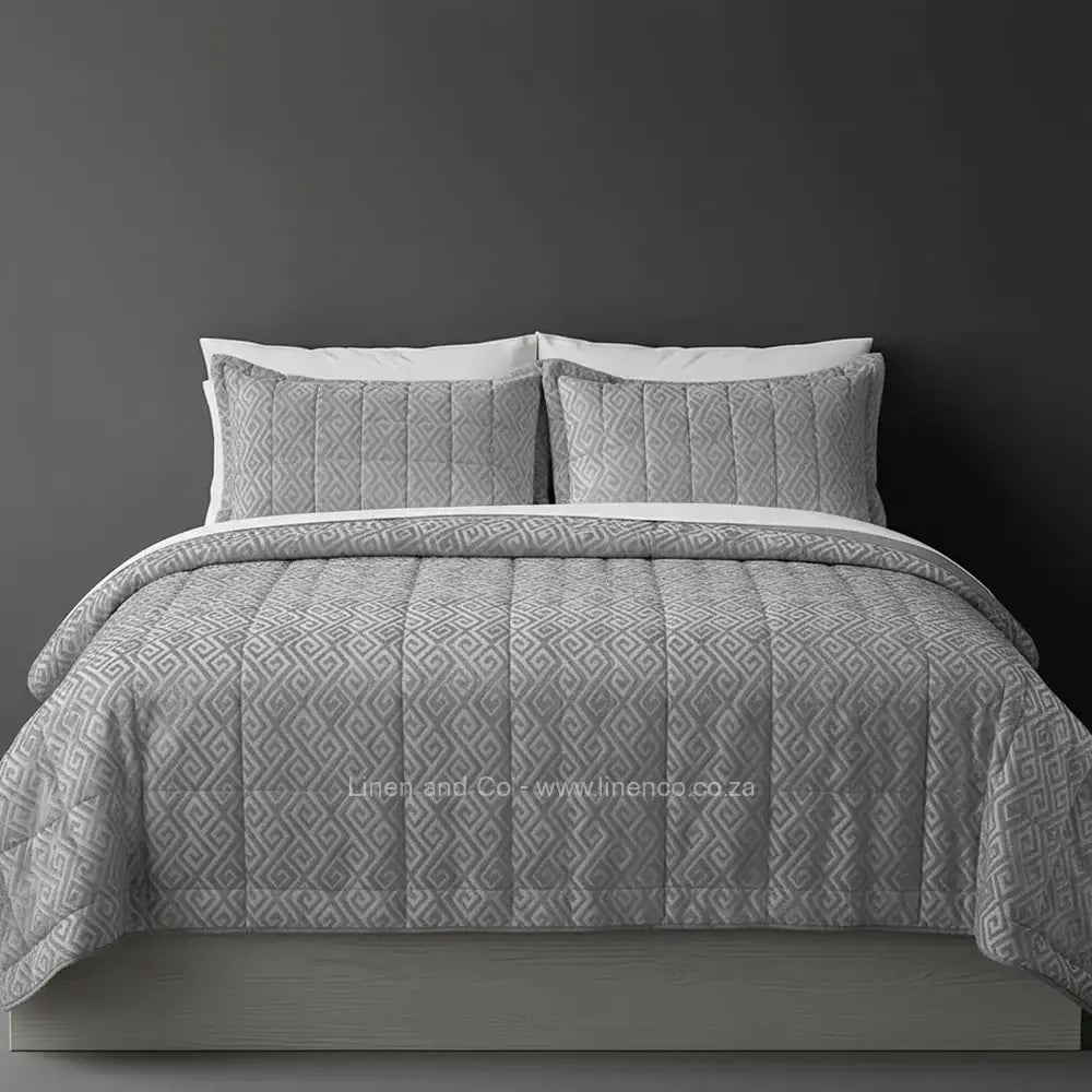 Luxury grey cambridge comforter with quilted patterned design displayed on bed, featuring premium neutral tones and elegant texture, hospitality-grade bedding by Linen and Co