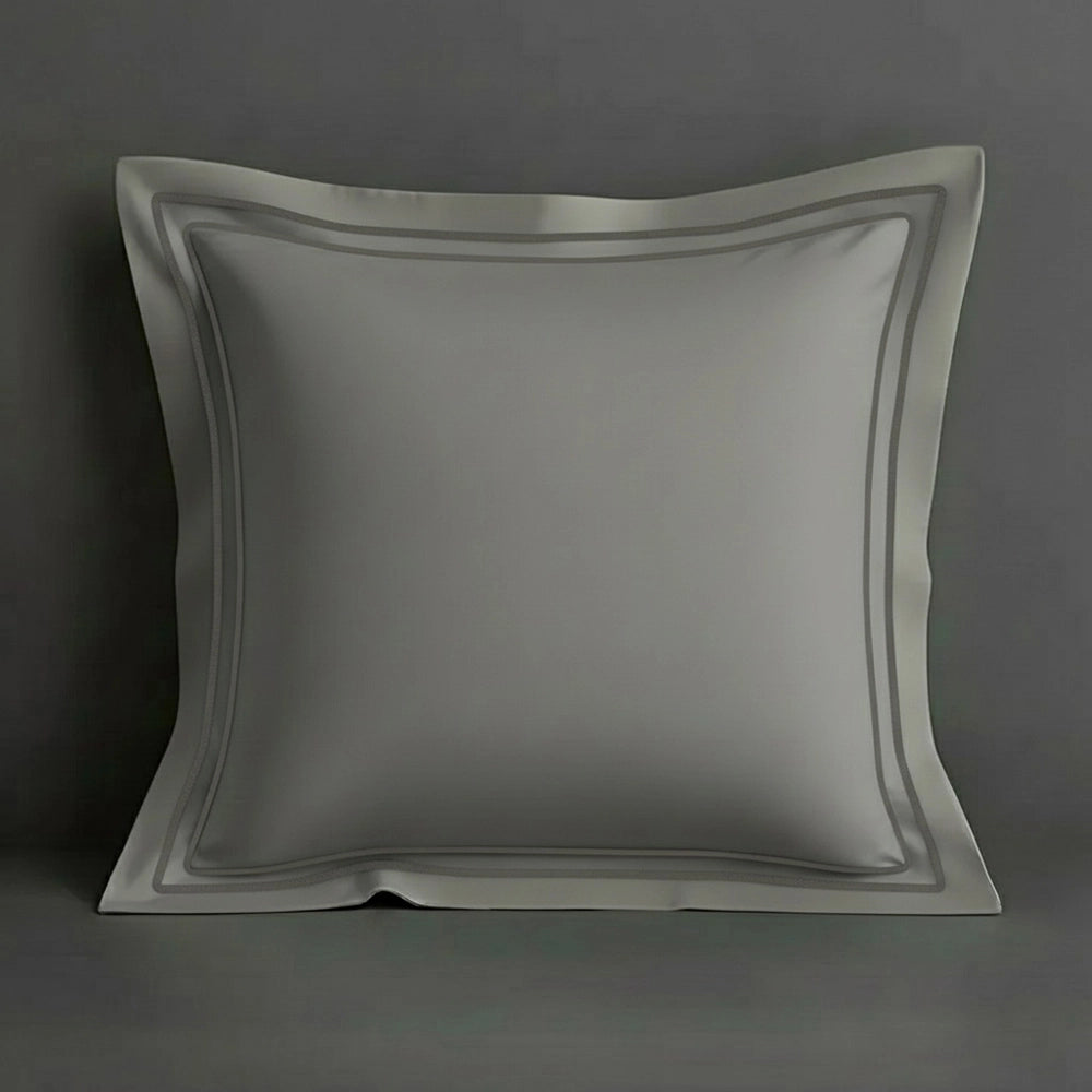 Grey oxford pillow case with two row satin stitch detail on a grey background. Luxury Hotel Linen by Linen and Co.