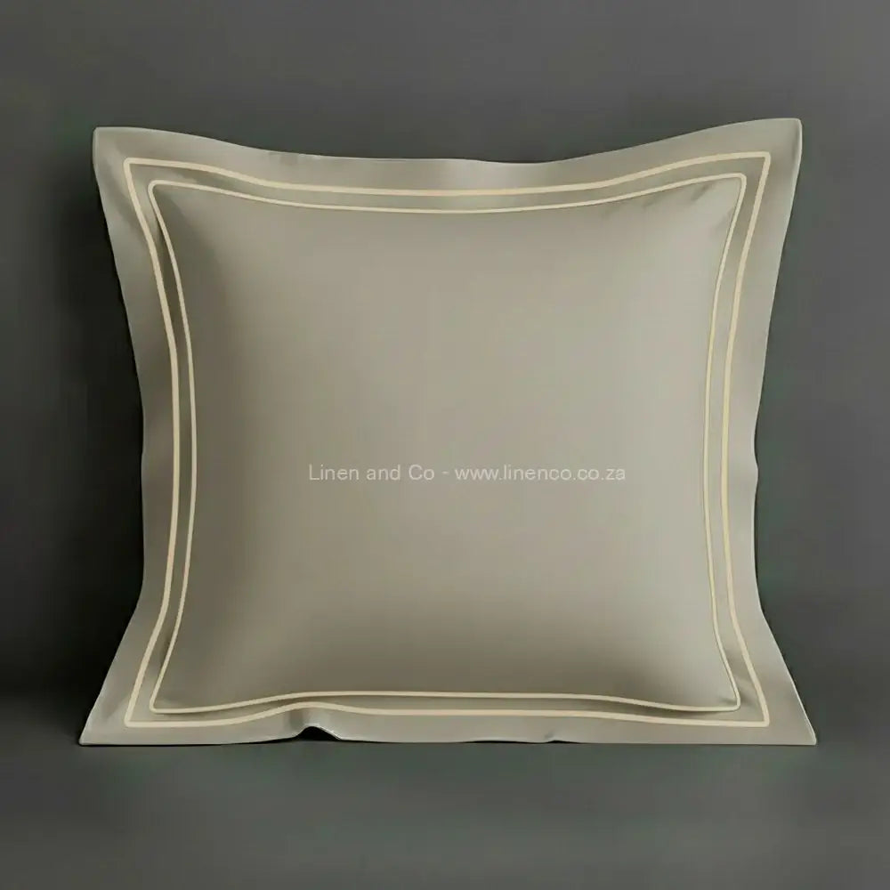 Stone oxford pillow case with two row satin stitch detail on a grey background. Luxury Hotel Linen by Linen and Co.