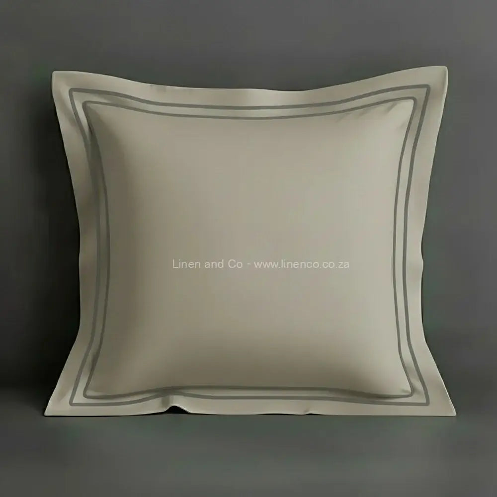 Stone oxford pillow case with two row satin stitch detail on a grey background. Luxury Hotel Linen by Linen and Co.