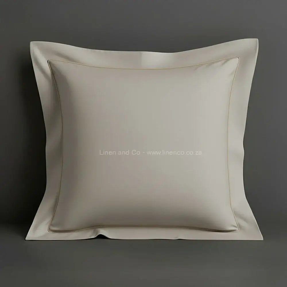 Stone oxford pillow case with one row satin stitch detail on a grey background. Luxury Hotel Linen by Linen and Co.