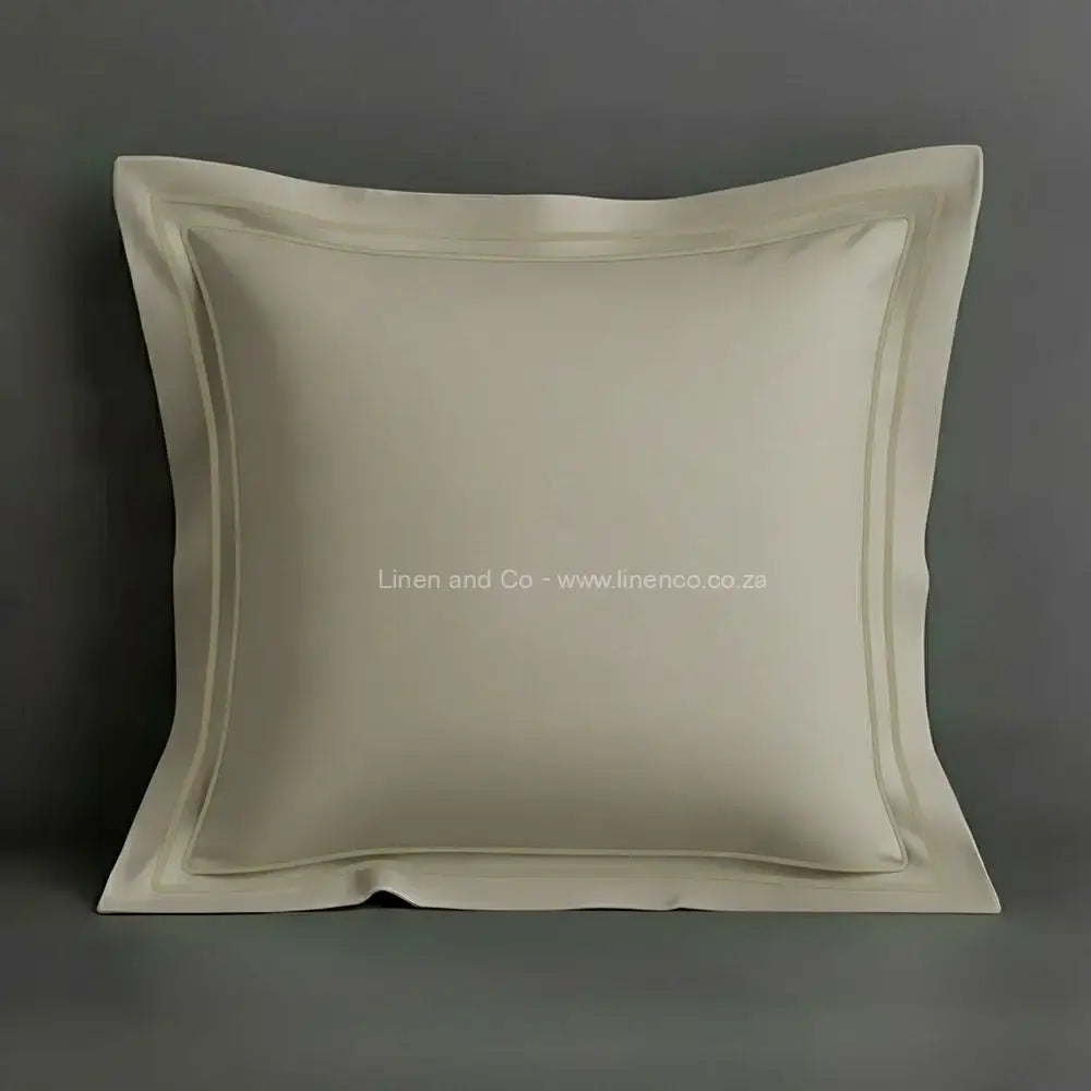 Stone oxford pillow case with two row satin stitch detail on a grey background. Luxury Hotel Linen by Linen and Co.