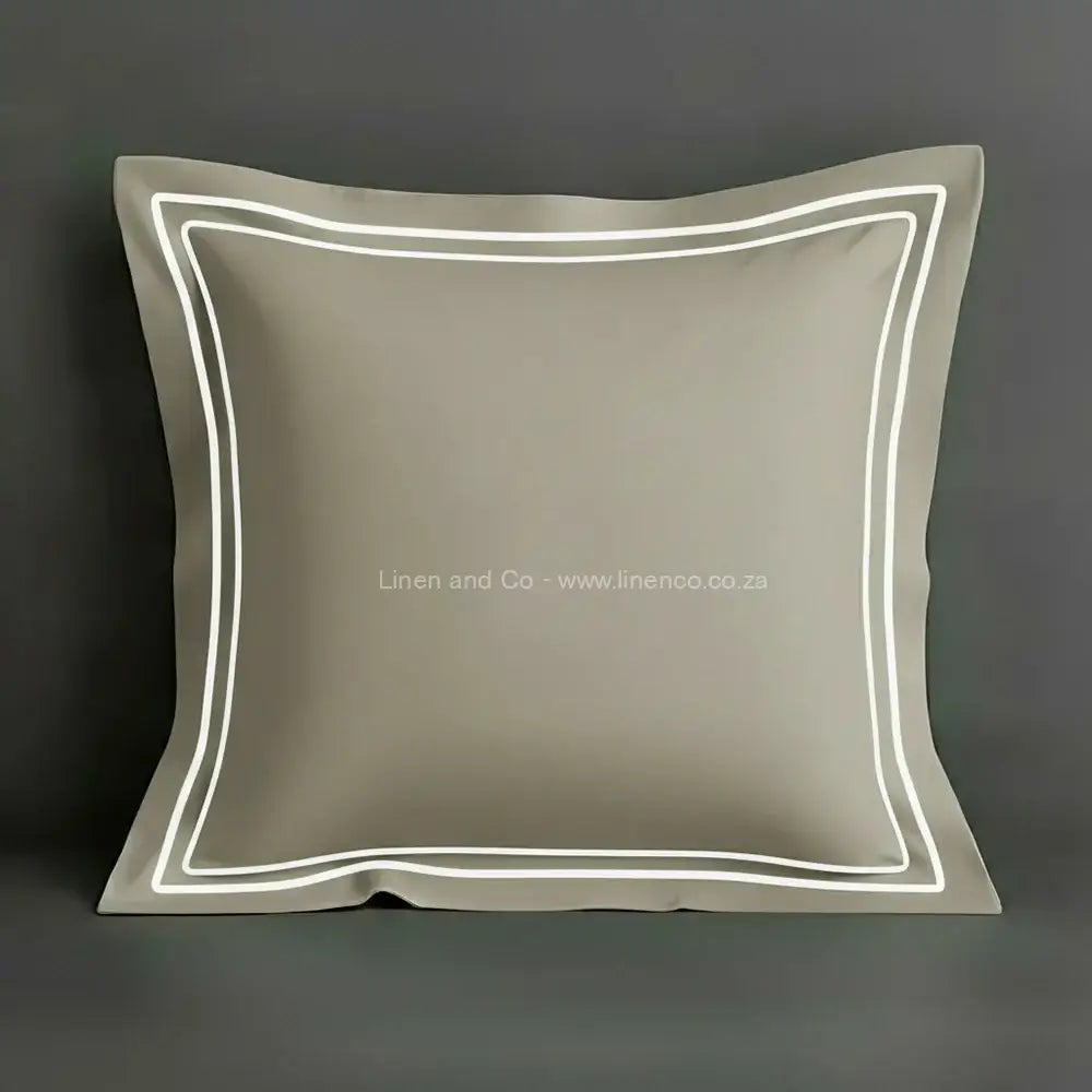 Stone oxford pillow case with two row satin stitch detail on a grey background. Luxury Hotel Linen by Linen and Co.