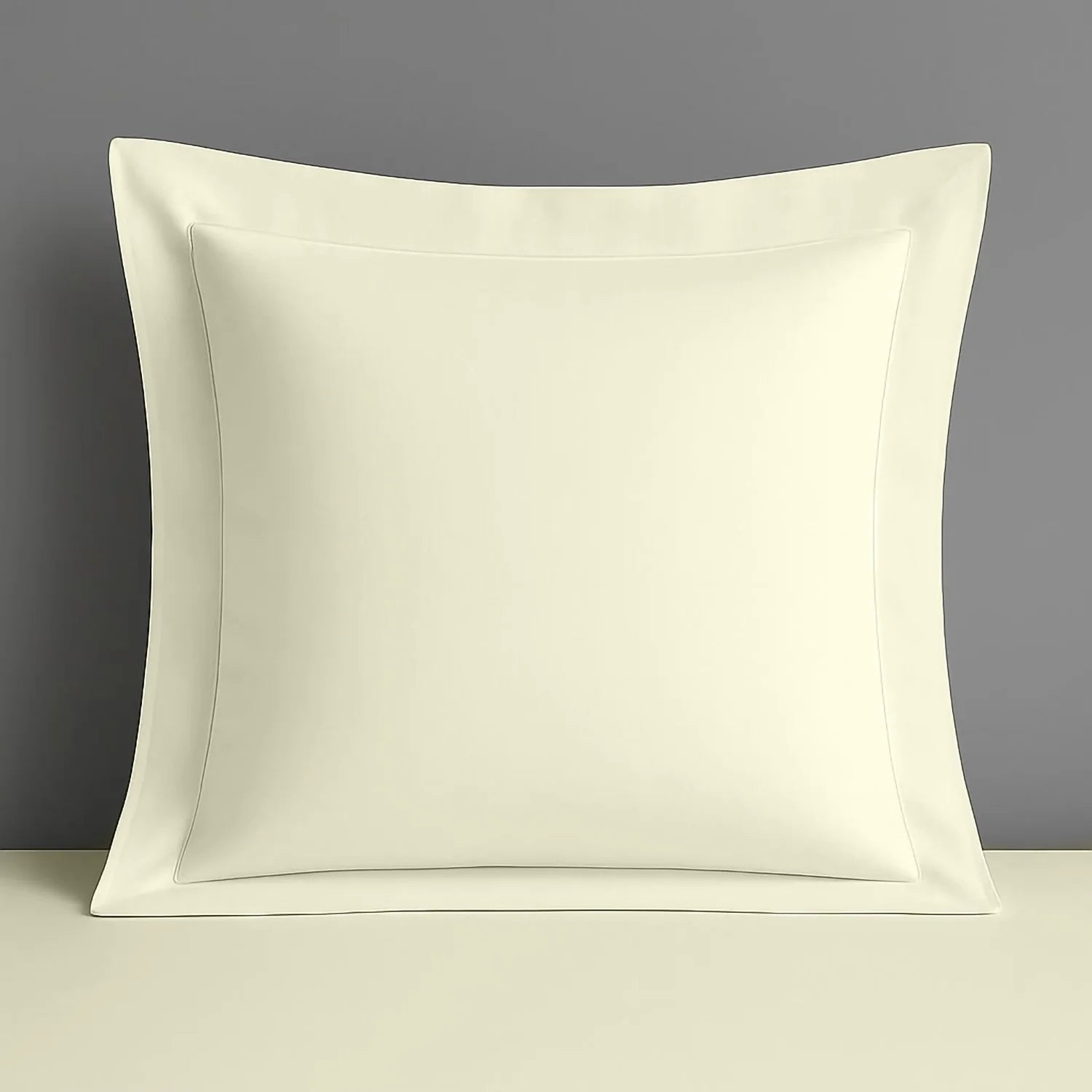 Cream Oxford continental pillow case on a grey background