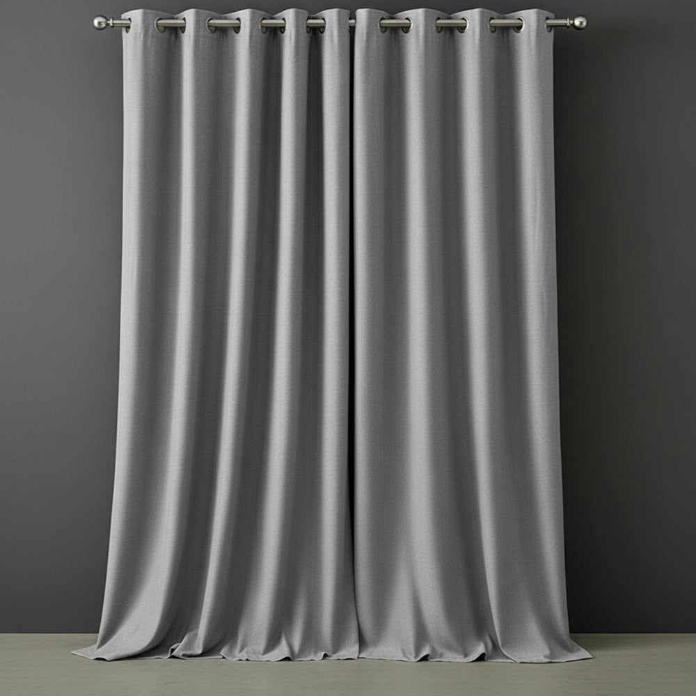 Light Grey Textured Self Lined Curtains with eyelet header on brushed steel rod – Linen & Co luxury window treatments