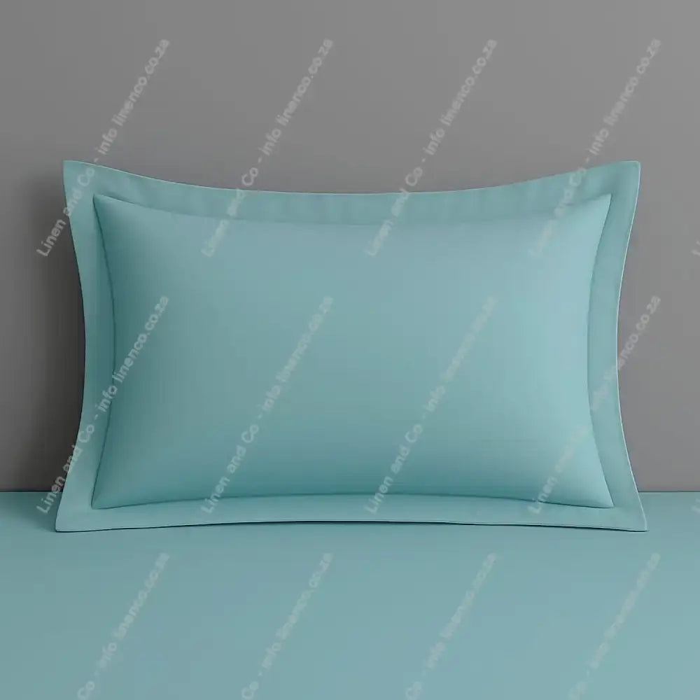 Duck Egg Oxford pillow case on a grey background